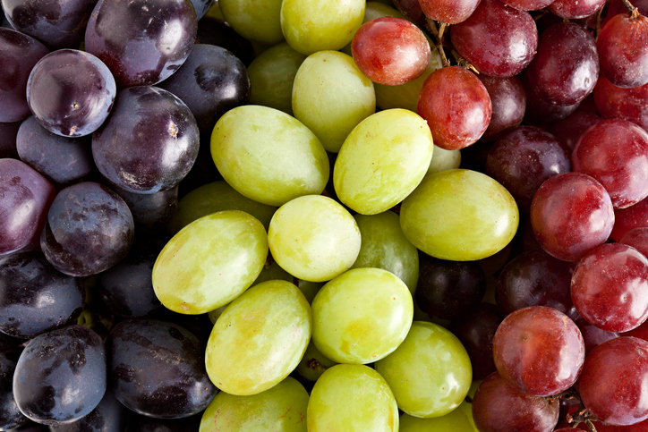 Black, green (or white), and red grapes. 